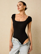 Plain Ribbed Knit Bodysuit Is A Form-Fitting Bodysuit Made Of Ribbed Elastic Material With A Backless Design