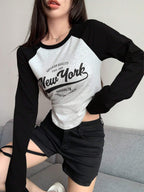 Contrast Raglan Sleeve Letter Graphic Curved Hem Tee