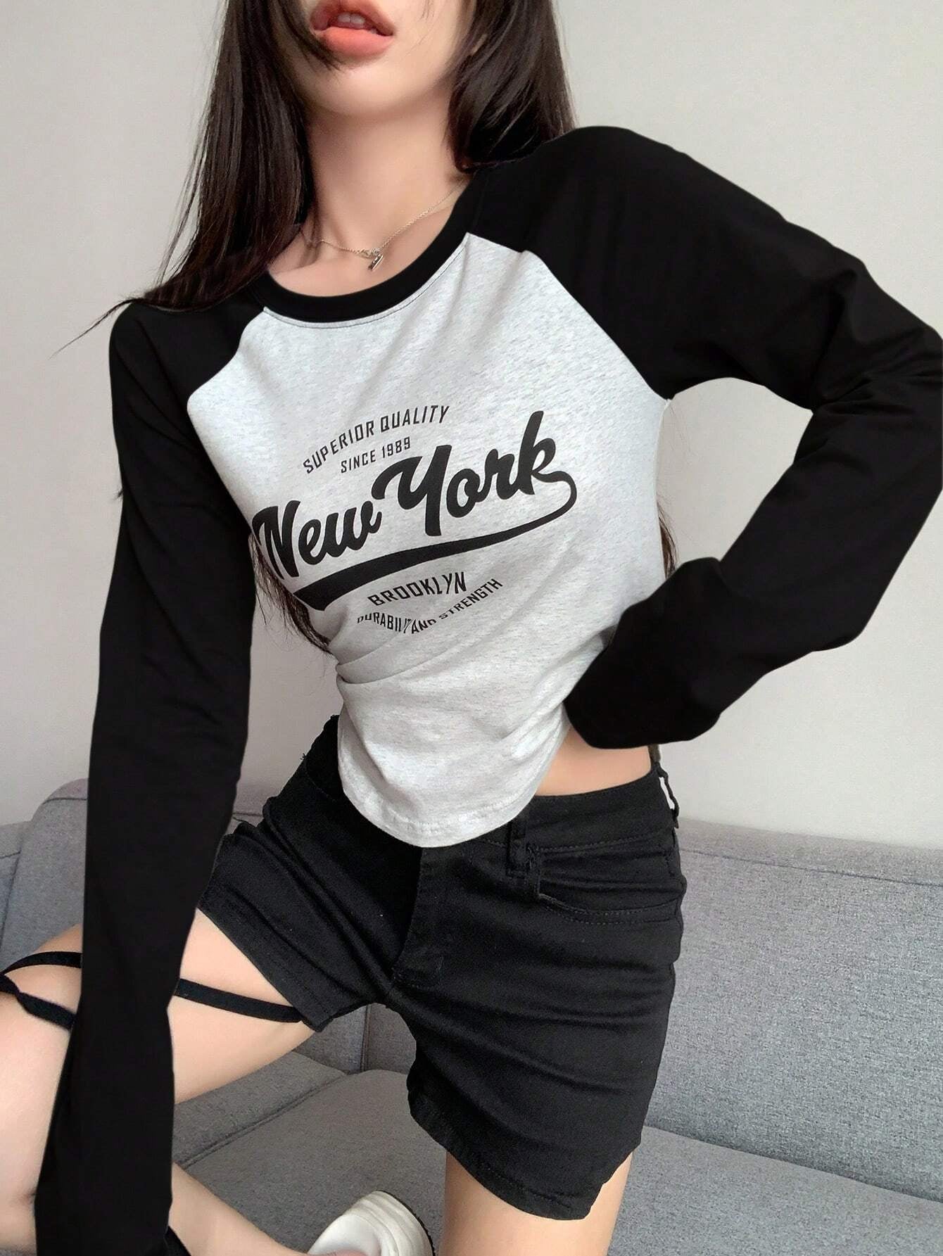 Contrast Raglan Sleeve Letter Graphic Curved Hem Tee