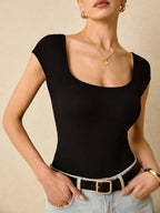 Plain Ribbed Knit Bodysuit Is A Form-Fitting Bodysuit Made Of Ribbed Elastic Material With A Backless Design