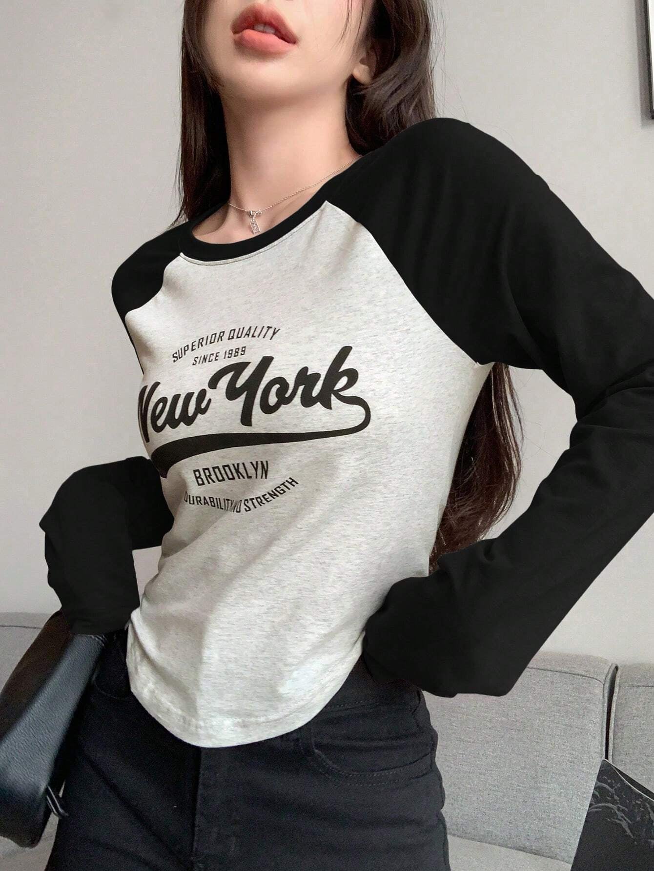 Contrast Raglan Sleeve Letter Graphic Curved Hem Tee