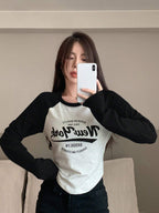 Contrast Raglan Sleeve Letter Graphic Curved Hem Tee