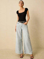 Plain Ribbed Knit Bodysuit Is A Form-Fitting Bodysuit Made Of Ribbed Elastic Material With A Backless Design