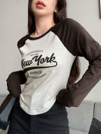 Contrast Raglan Sleeve Letter Graphic Curved Hem Tee